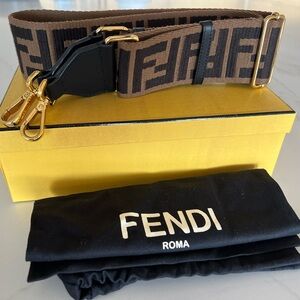 Authentic Pristine FENDI brown Zucca Canvas bag strap gold hardware.